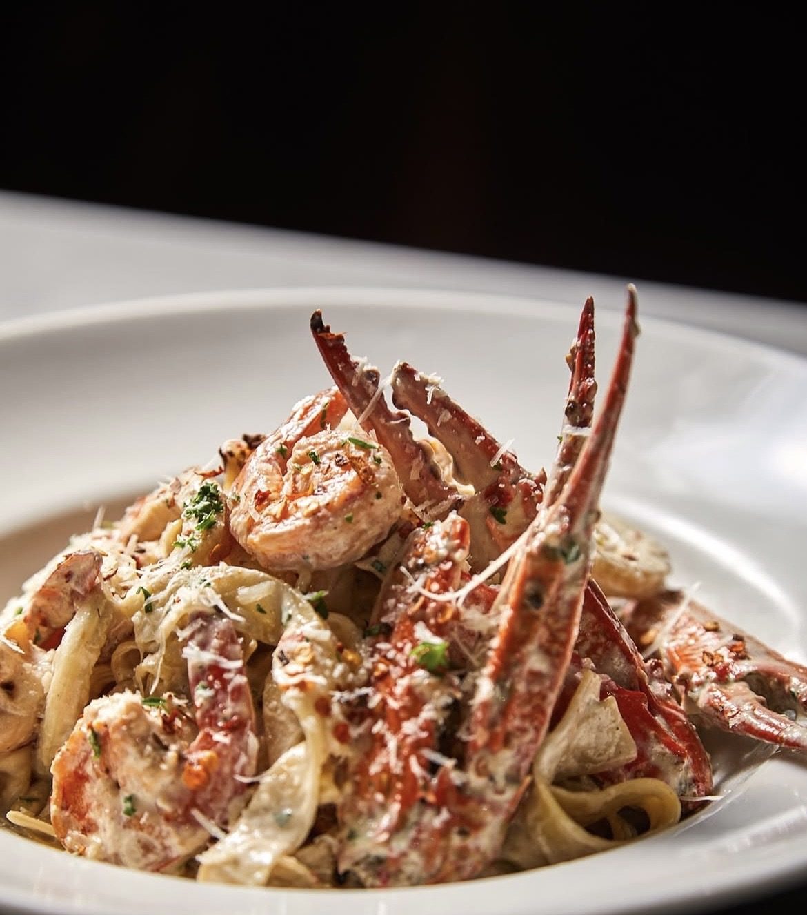 Seafood linguine with prawns and crab in a creamy sauce